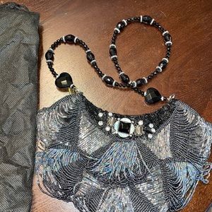 Mary Frances string beaded handbag with beaded long handle.